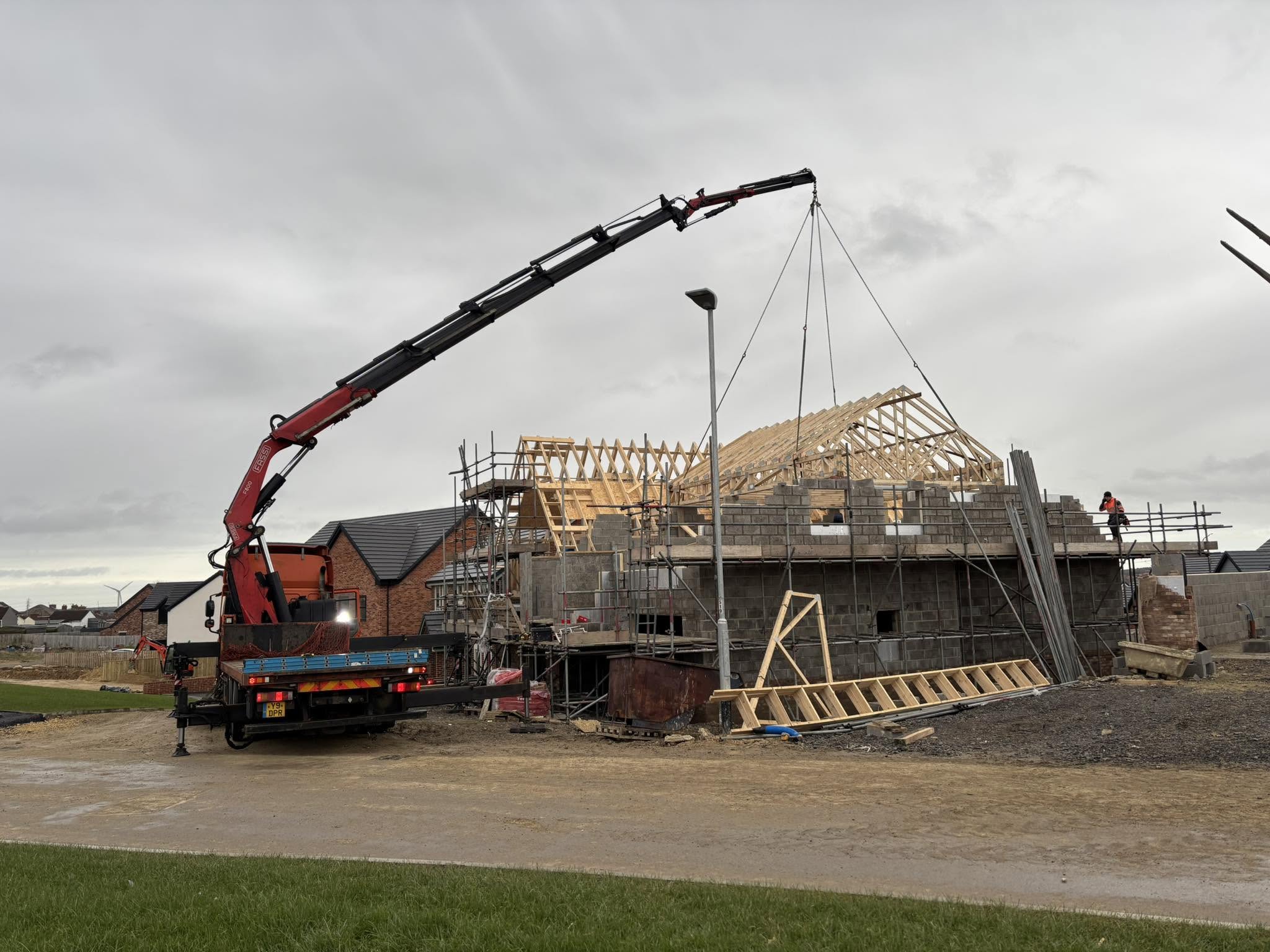 Crane Lorry Lifting Engineered Roof Trusses