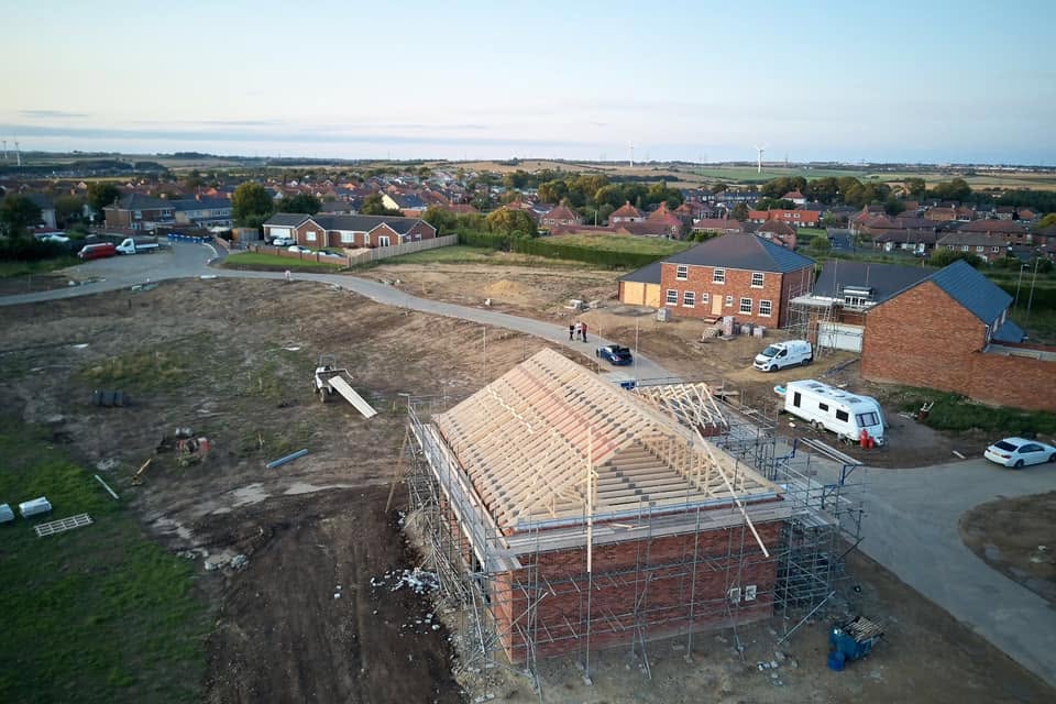 Aerial Drone View – Multi-Plot Housing Development Roof Trusses